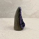 Base cut amethyst crystal 12cm, tall tapered spire, side profile — Eternal Spirit