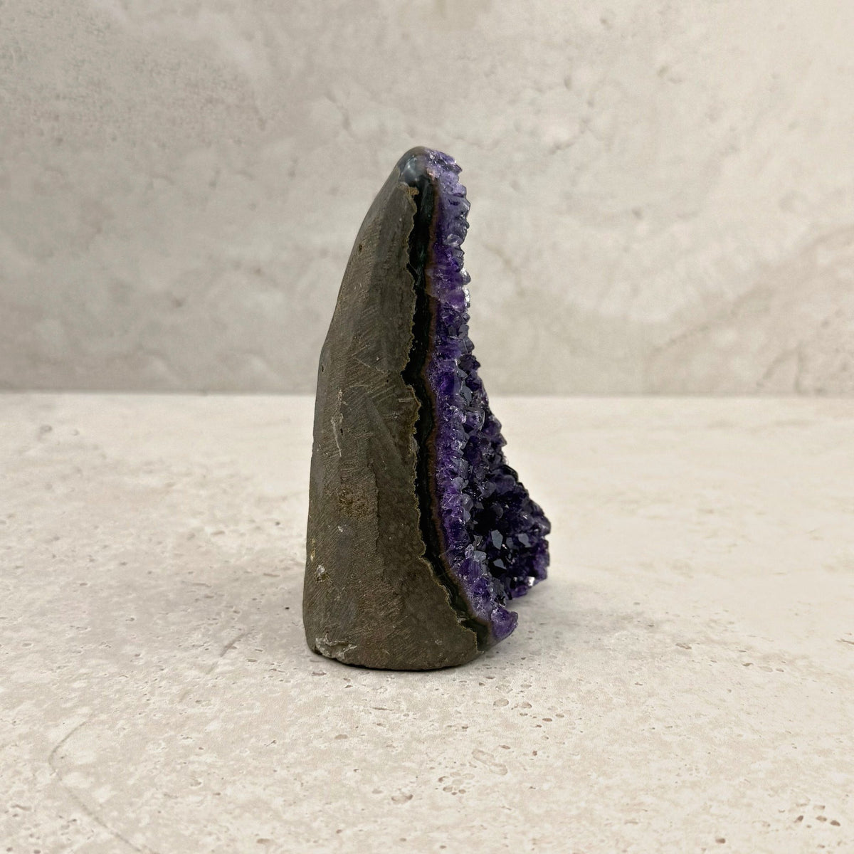 Base cut amethyst crystal 12cm, tall tapered spire, side profile — Eternal Spirit