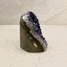 Base cut amethyst crystal 13.5cm, white crystal edge along the grey shell, side view — Eternal Spirit