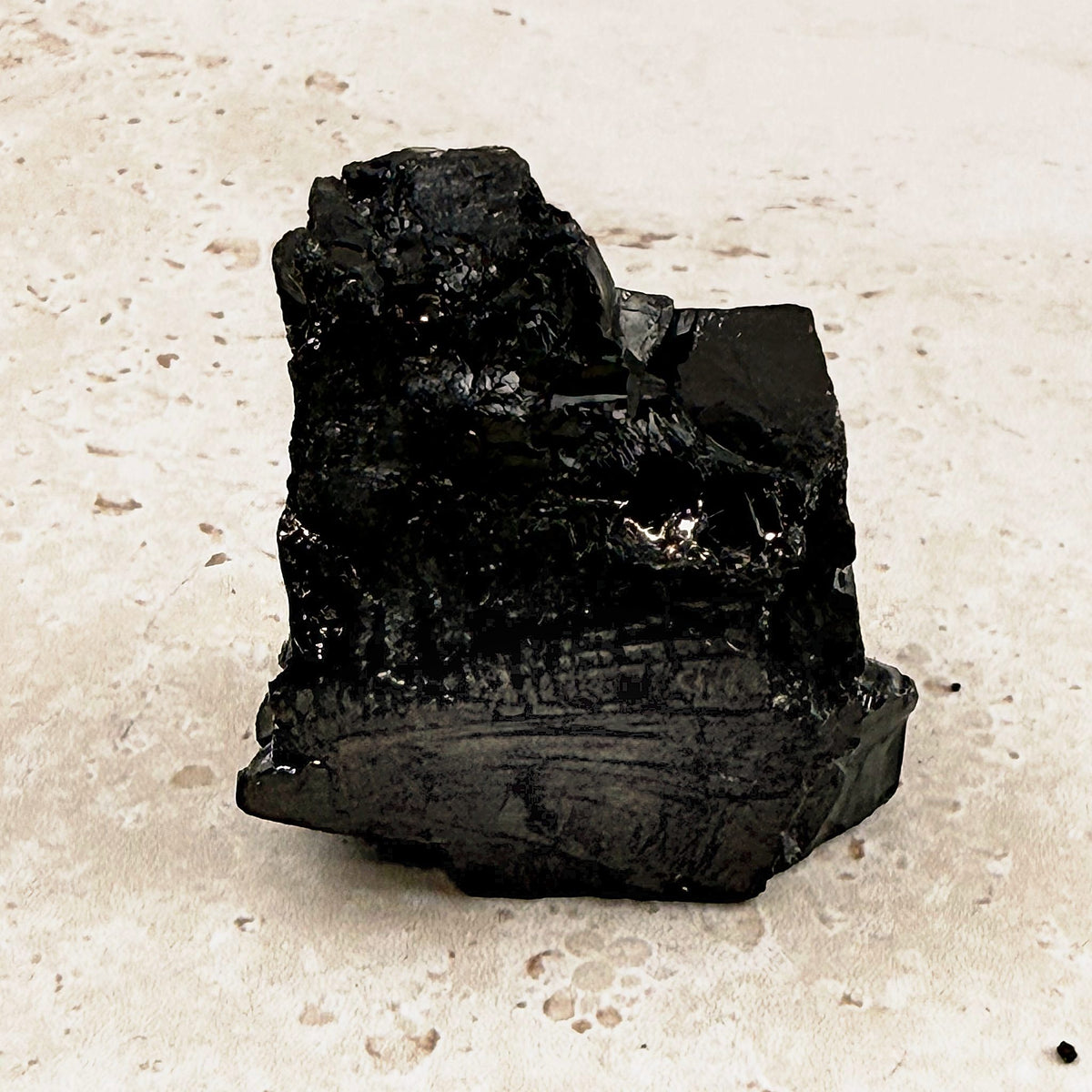 Stout elite shungite rough crystal 4.5cm, glossy and matte black faces, side view — Eternal Spirit