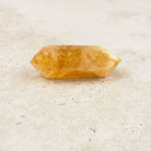 Stout heated citrine crystal wand 7cm, honey gold all through, low side view — Eternal Spirit