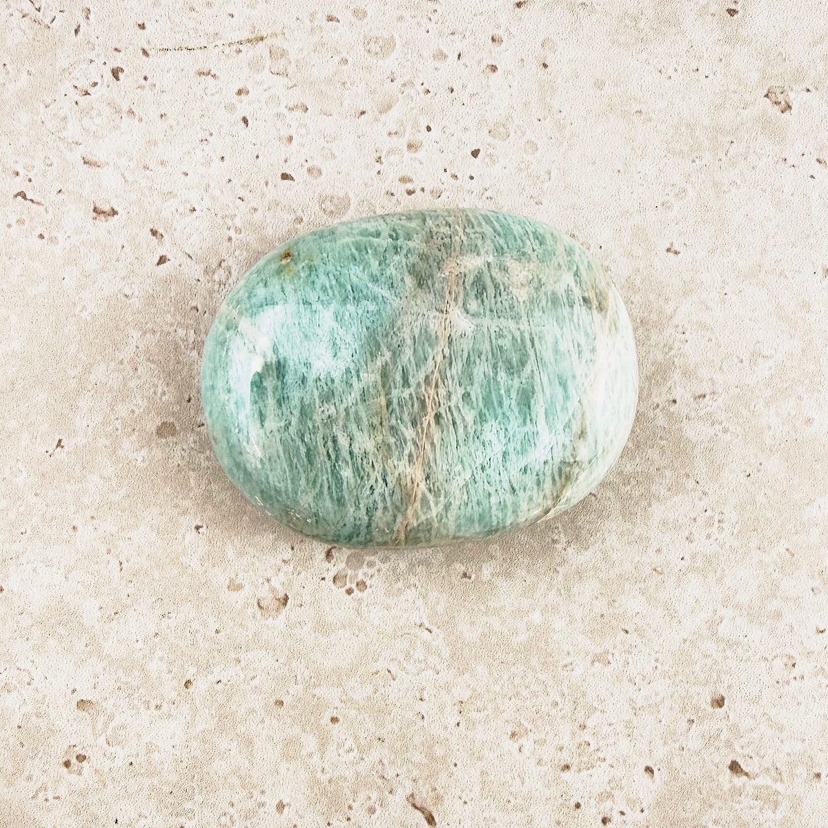 Streaked amazonite crystal soap stone 5cm, sea green with pale streaks, viewed from above — Eternal Spirit