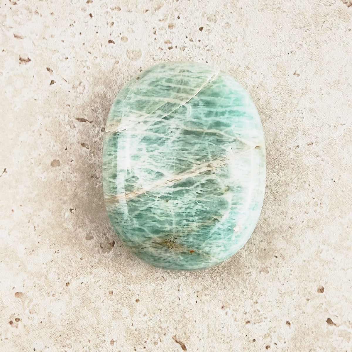 Streaked amazonite crystal soap stone 5cm, sea green with pale streaks, lengthways view — Eternal Spirit