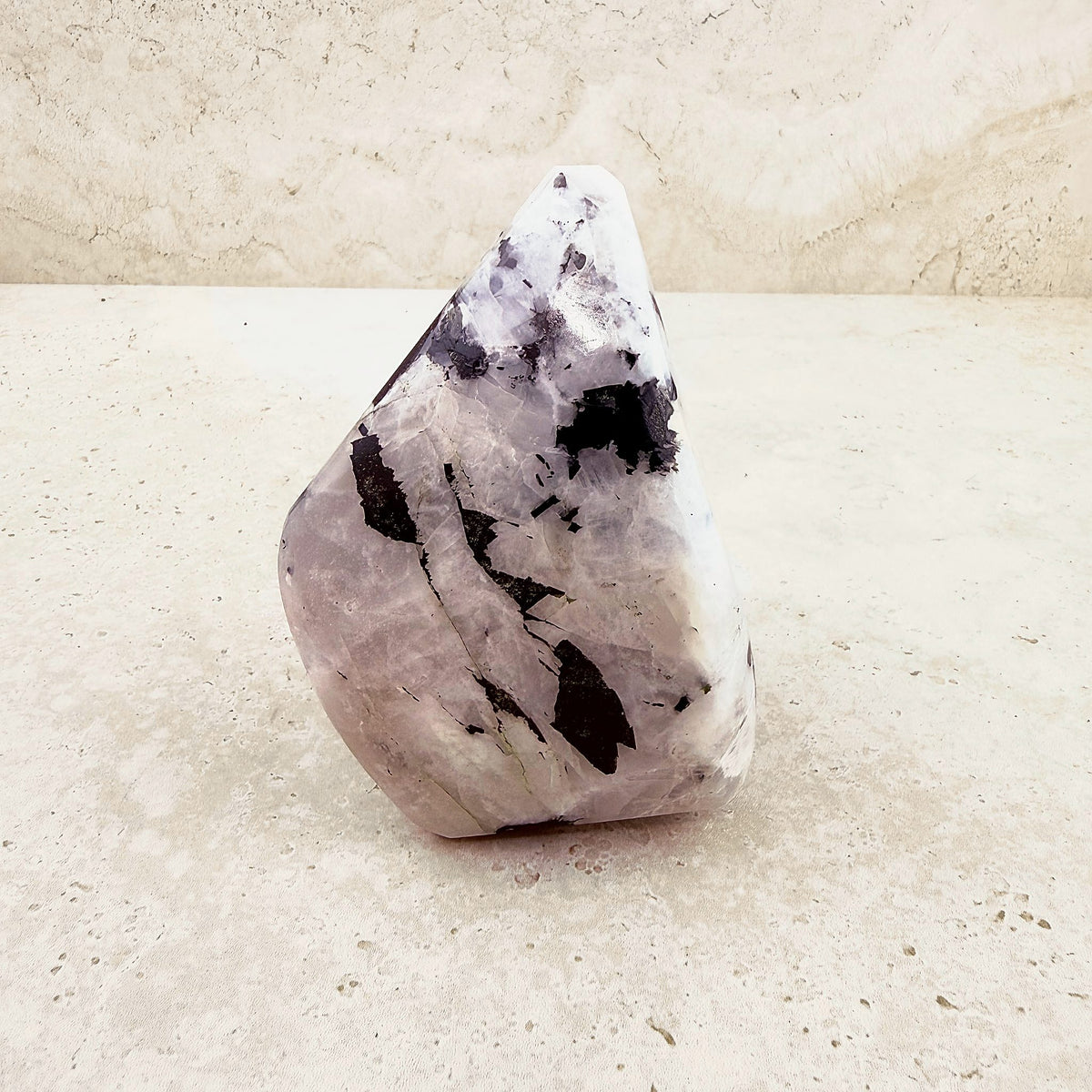 Tall rainbow moonstone crystal freeform 11cm, creamy white with bold dark patches, front view — Eternal Spirit