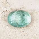 Wide amazonite crystal soap stone 5.5cm, broad teal oval, angled view — Eternal Spirit