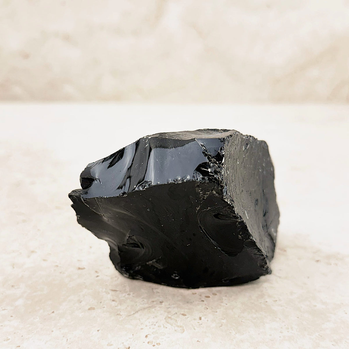 Wide black obsidian rough 10cm, glossy volcanic glass chunk, side view — Eternal Spirit